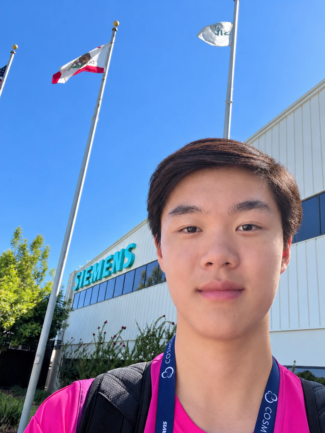 Xinyang outside a Siemens building