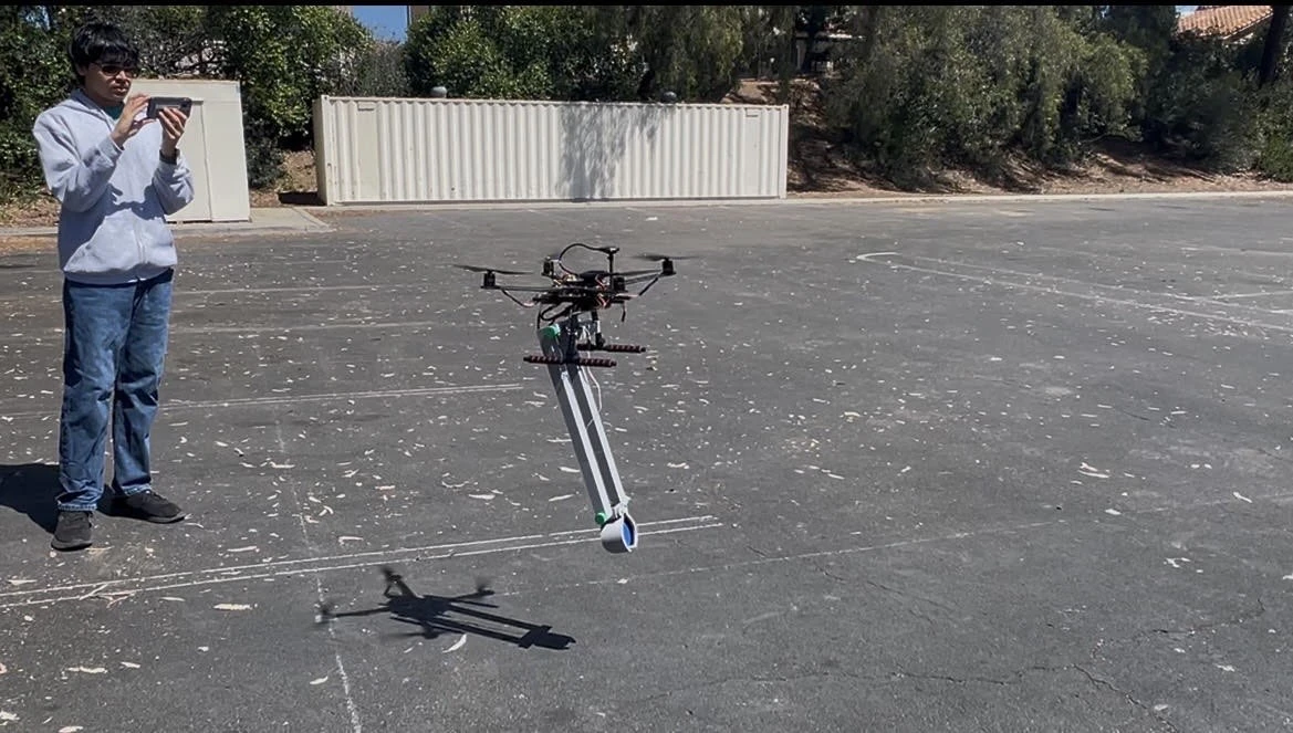 Outdoor drone flight with the arm mechanism